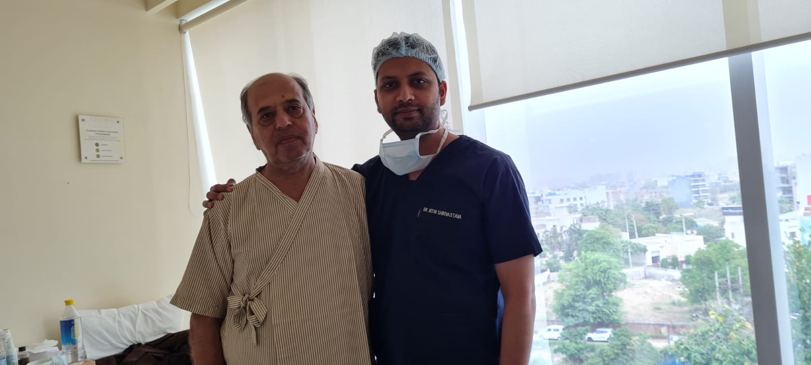 Dr. Nitin greeting a recovering patient on ward rounds